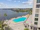 Beautiful pool overlooking the water, offering stunning views and a relaxing atmosphere at 5915 Sea Ranch Dr # 703, Hudson, FL 34667
