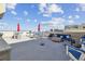 Expansive rooftop patio with multiple seating areas, ideal for entertaining at 5915 Sea Ranch Dr # 703, Hudson, FL 34667