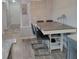 Dining area with bar-height table and chairs conveniently located off the kitchen at 6421 Banyan Blvd # 302, New Port Richey, FL 34652