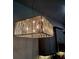 Modern dining room with a rectangular light fixture at 6421 Banyan Blvd # 302, New Port Richey, FL 34652