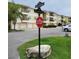 Street view with condo buildings and a stop sign at 6421 Banyan Blvd # 302, New Port Richey, FL 34652