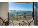 Enjoy the waterfront views from this balcony with seating at 690 Island Way # 404, Clearwater Beach, FL 33767