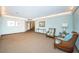 Inviting lobby area with comfortable seating and a well-lit, carpeted hallway at 690 Island Way # 404, Clearwater Beach, FL 33767