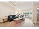 A spacious and inviting living room with modern decor and plenty of natural light at 7245 Wood Creek Dr # 29, Sarasota, FL 34231