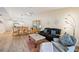 Open concept living room and dining area featuring modern flooring and comfortable seating at 7245 Wood Creek Dr # 29, Sarasota, FL 34231