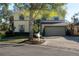 Two-story home featuring well-maintained landscaping and a two-car garage at 732 June Lake Ln, Brandon, FL 33510