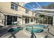 The backyard features a screened-in pool with an attached spa and access from multiple rooms at 732 June Lake Ln, Brandon, FL 33510
