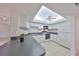 Bright and modern kitchen featuring white appliances and a skylight at 1028 Apollo Beach Blvd # 13, Apollo Beach, FL 33572