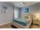 Bright bedroom showcasing coastal decor, a comfy bed, and a calming atmosphere for a peaceful retreat at 10764 70Th Ave # 2110, Seminole, FL 33772