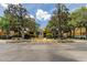 Charming community center with lush landscaping, a fountain, and convenient parking at 10764 70Th Ave # 2110, Seminole, FL 33772