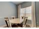 Dining room with window and white dining table at 10764 70Th Ave # 2110, Seminole, FL 33772