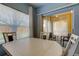 Dining table view into balcony with seating at 10764 70Th Ave # 2110, Seminole, FL 33772