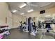 Well-equipped gym with modern exercise machines, free weights, and mirrored wall for your fitness convenience at 10764 70Th Ave # 2110, Seminole, FL 33772