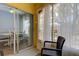 Inviting patio with dining area, comfortable chairs, and serene outdoor view at 10764 70Th Ave # 2110, Seminole, FL 33772
