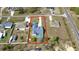 Aerial view showcasing the property lines of this single Gathering home, pool, and long driveway at 11040 Flicker Rd, Brooksville, FL 34613