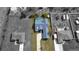 Aerial view of a single Gathering home, showcasing its pool and long driveway at 11040 Flicker Rd, Brooksville, FL 34613