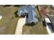 An aerial view of a well-maintained home with a screened-in pool and a long driveway at 11040 Flicker Rd, Brooksville, FL 34613