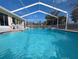 The pool is perfect for swimming and relaxing, and the screened enclosure keeps it clean at 11040 Flicker Rd, Brooksville, FL 34613