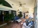 The sunroom is a great place to relax on the wicker furniture and enjoy the natural light at 11040 Flicker Rd, Brooksville, FL 34613