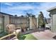 Backyard featuring seating, plants, a wooden fence, and a gate at 1370 70Th N St # 2-1382, St Petersburg, FL 33710