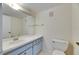 Bathroom features a single sink, vanity, and toilet at 1370 70Th N St # 2-1382, St Petersburg, FL 33710