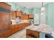 This kitchen features stainless appliances, and a center island with bar stool seating at 1724 Amberwynd W Cir, Palmetto, FL 34221