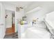 Functional laundry area equipped with washer, dryer, and overhead shelf for storage at 1801 E Mcberry St, Tampa, FL 33610
