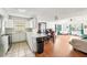 Open-concept living room seamlessly connects to the kitchen and dining area at 1801 E Mcberry St, Tampa, FL 33610