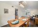 Open floor plan with dining area and living room in a well-lit space at 1904 Pepperwood Pl, Brandon, FL 33510