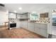 Modern kitchen features updated countertops and stainless steel appliances at 1904 Pepperwood Pl, Brandon, FL 33510