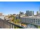 Balcony view showcasing the city skyline and lush greenery, a perfect spot to relax and entertain at 201 W Laurel St # 1006, Tampa, FL 33602