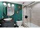 Elegant bathroom with glass door shower and mirror at 201 W Laurel St # 1006, Tampa, FL 33602