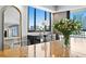 An expansive view from the dining room showcasing the stylish décor and beautiful city views at 201 W Laurel St # 1006, Tampa, FL 33602