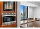 Kitchen showcasing stainless steel microwave, built-in wine storage, and a beautiful city view at 201 W Laurel St # 1006, Tampa, FL 33602