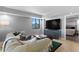 Bright living room featuring a stylish couch, unique coffee table, and city views at 201 W Laurel St # 1006, Tampa, FL 33602