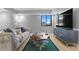 Cozy living room with modern decor, unique coffee table, and large windows offering natural light at 201 W Laurel St # 1006, Tampa, FL 33602