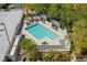 Aerial view of community swimming pool with lounging and dining areas at 201 W Laurel St # 1006, Tampa, FL 33602