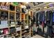 Organized walk-in closet with shelves for shoes and bags, plus hanging space for clothes at 201 W Laurel St # 1006, Tampa, FL 33602