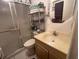 Bathroom featuring a vanity, mirror, toilet, and shower with a glass door at 24862 Us Highway 19 N # 3001, Clearwater, FL 33763