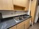 Kitchen sink with stainless steel double basin and ample counter space, in a clean and functional kitchen at 24862 Us Highway 19 N # 3001, Clearwater, FL 33763