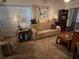 Comfortable living room featuring a sofa, side tables with lamps, and a coffee table at 24862 Us Highway 19 N # 3001, Clearwater, FL 33763