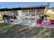 Cozy patio space with colorful chairs and a view of the surrounding landscape at 24862 Us Highway 19 N # 3001, Clearwater, FL 33763
