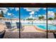 Relaxing poolside view with comfortable lounge chairs, and a sunny sky to enjoy the pool and outdoor ambiance at 24862 Us Highway 19 N # 3001, Clearwater, FL 33763