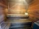 Interior view of a wooden sauna, showcasing the benches, wood-paneled walls and with space to relax and rejuvenate at 24862 Us Highway 19 N # 3001, Clearwater, FL 33763