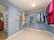 Large walk-in closet boasts plenty of shelving and hanging storage and direct access to the bedroom at 2671 Clubhouse N Dr, Clearwater, FL 33761