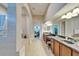 Large main bathroom with double sinks, granite countertops, and a separate tub at 2903 Marble Crest Dr, Land O Lakes, FL 34638