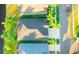 Birds-eye view showing mature landscaping, backyard, and pond at 3339 Brenford Pl, Land O Lakes, FL 34638