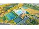 An aerial view of the community pool, tennis and basketball courts at 3339 Brenford Pl, Land O Lakes, FL 34638