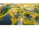 Beautiful aerial perspective of a community entrance, showcasing the surrounding landscape and neighborhood layout at 3339 Brenford Pl, Land O Lakes, FL 34638