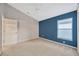 Bright bedroom offers a calming atmosphere and a large window at 3339 Brenford Pl, Land O Lakes, FL 34638